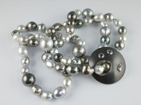 Pearls with silver and sapphire disc