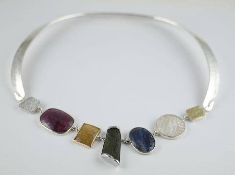 Multicolored Sapphires, Mother of Pearl, Gold disc on forged silver necklace