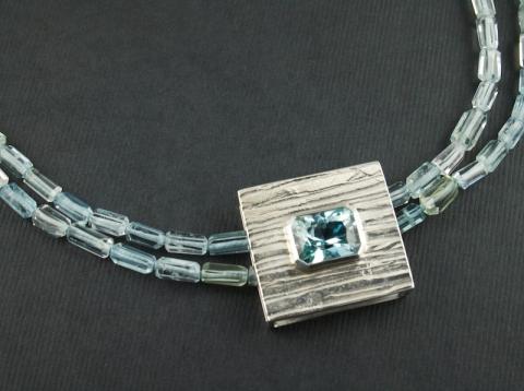 Russian blue Topaz 8.5cts set in silver with Aquamarine beads