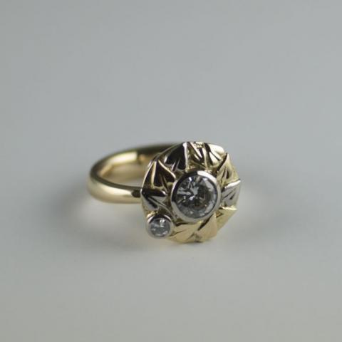 Diamond in 18ct yellow and white gold with bleeding heart leaves